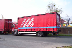 Red Side Curtains With Signwriting